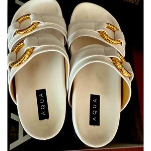 Nice leather, white and gold slide ins very comfortable